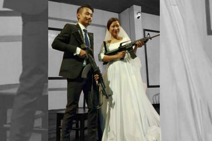 Naga couple arrested for posing guns in wedding pics