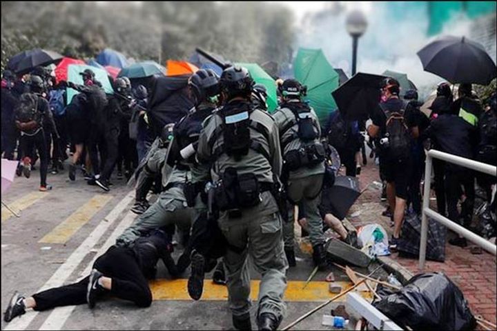 Hong Kong police defuse 2 homemade nail bombs in a school amid protests