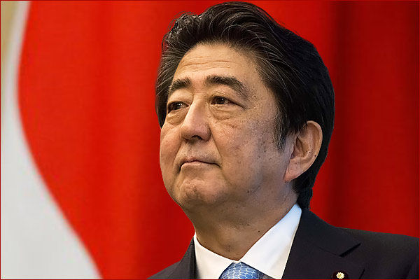 Japan PM Shinzo Abe amidst protests over the citizenship law