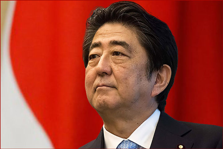 Japan PM Shinzo Abe amidst protests over the citizenship law