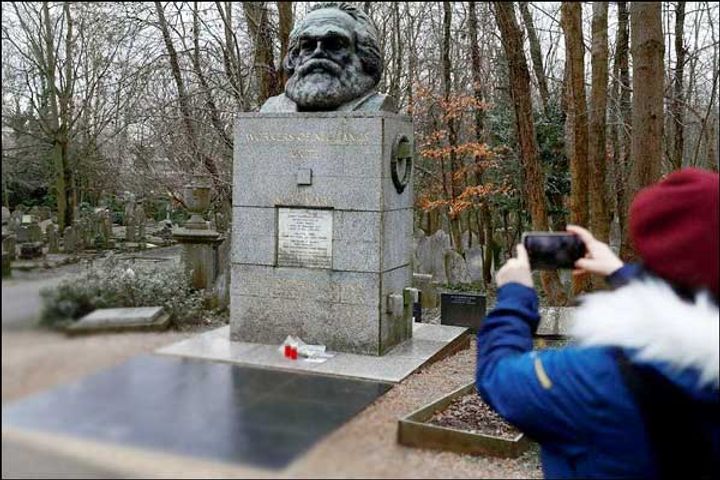 Chaotic elements write inflammatory messages on Karl Marx  grave