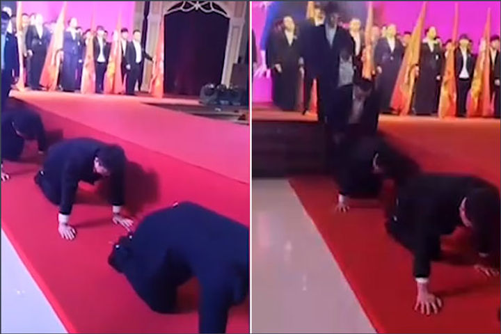Chinese workers crawl on their hands and knees after missing targets 