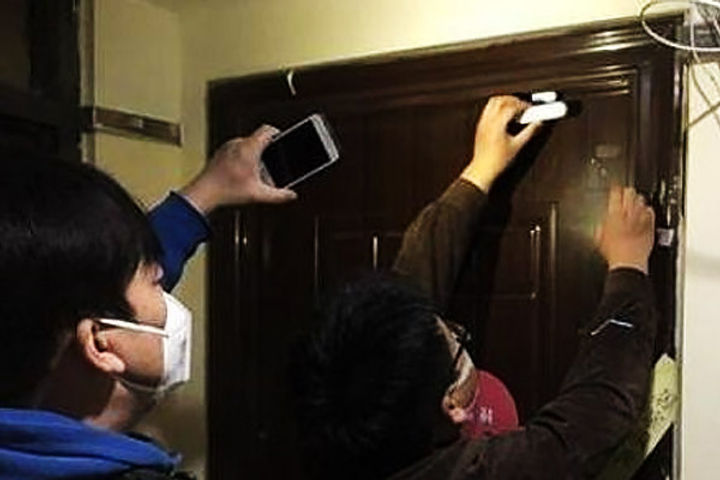 Chinese officials using electric door seals to lock Coronavirus affected people in