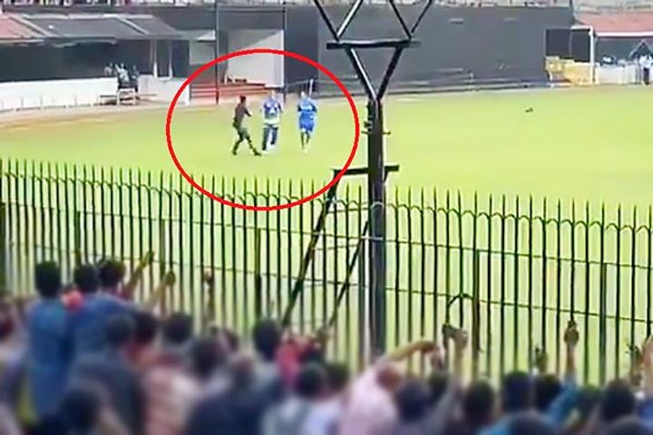 Fan breaches security shakes hand with Dhoni in Chepauk 