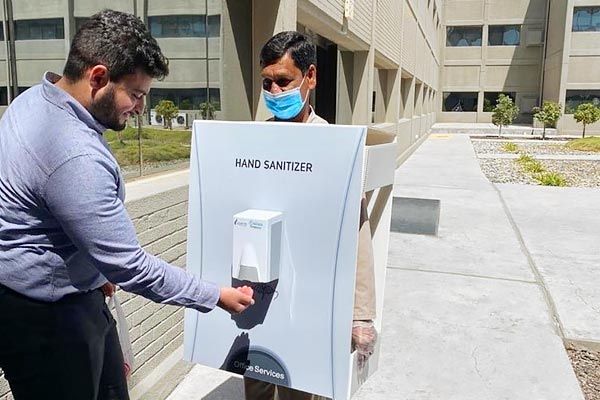 Saudi Aramco slammed for using foreign worker as Hand Sanitizer Bottle