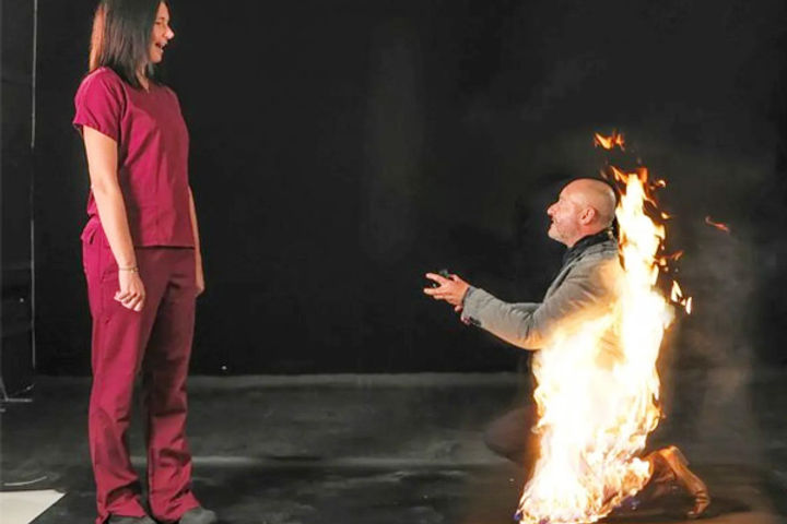 Stuntman proposes girlfriend for marriage while on fire and her answer was yes