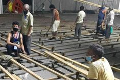 Migrant labourers return to work