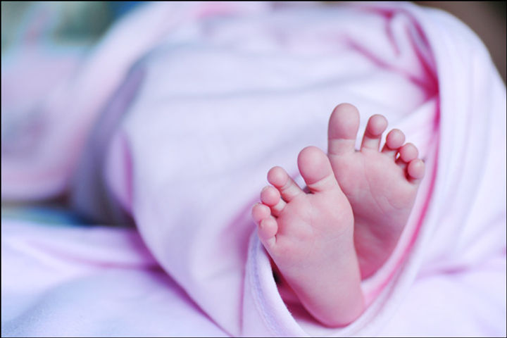 Woman sets baby ablaze