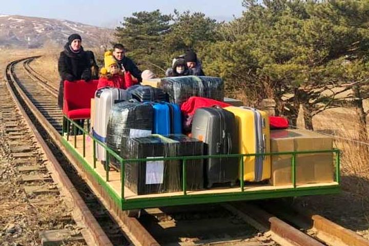 Russian diplomats returning on Rail trolley 