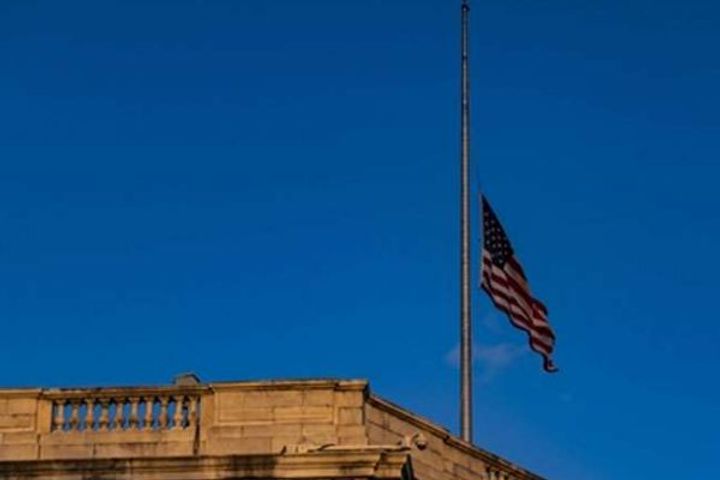 Biden expresses grief after policemans death on Capitol Hill White House flag tilted