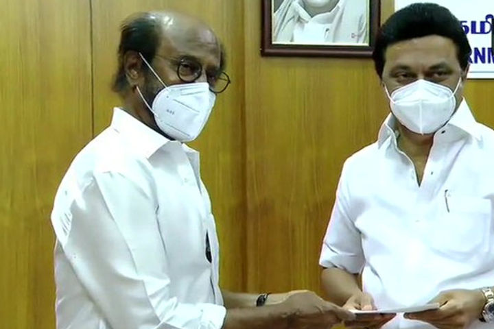 Rajinikanth handed over Rs 50 lakhs for COVID relief fund to MK Stalin Rajinikanth handed over Rs 50 lakhs for COVID relief fund to MK Stalin