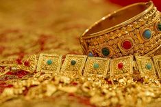Gold and silver futures prices declined in the domestic market