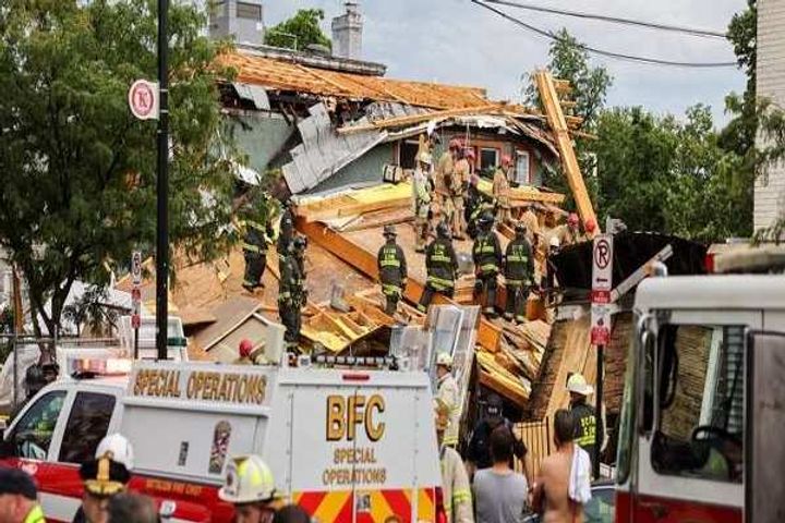 Partially built five storey building collapses in Washington DC United States