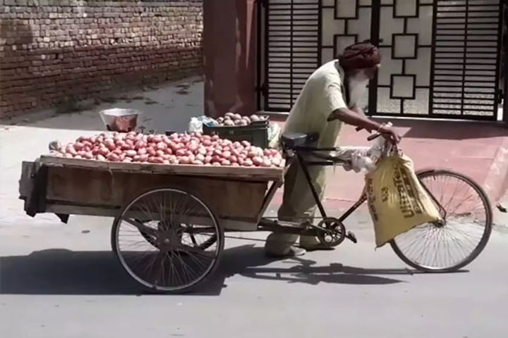 100-year-old man pulls cart