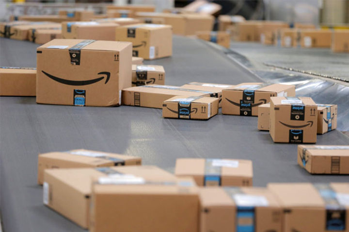 Put on masks again, Amazon tells warehouse workers amid COVID spread