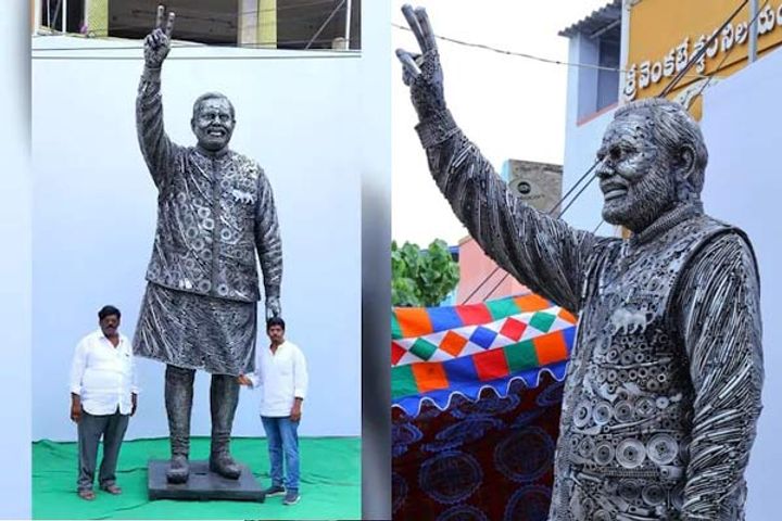 Father son duo build 14 feet tall statue of PM Modi using scrap material