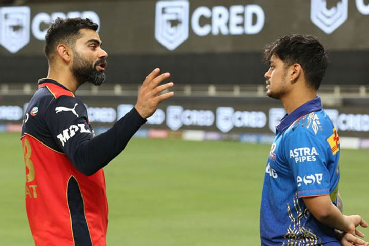 Virat Kohli consoles Ishan Kishan after RCB thrash MI Virat Kohli consoles Ishan Kishan after RCB thrash MI