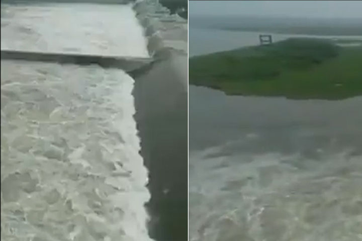 Gates of Ukai Dam opened to release water in Tapi river in Surat Gates of Ukai Dam opened to release water in Tapi river in Surat