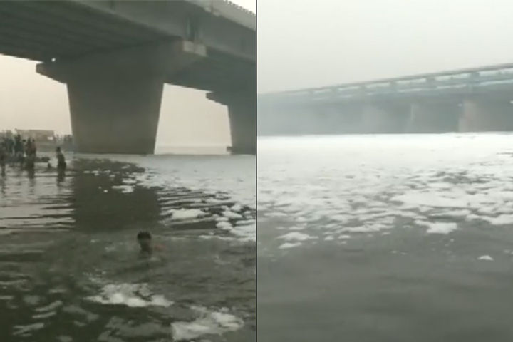 Devotees take a dip in polluted Yamuna on Chhath