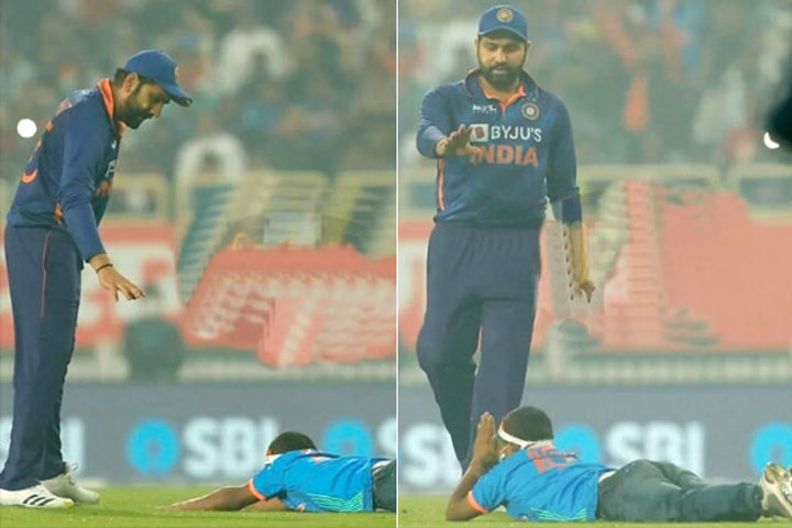 The man reached the ground to touch Rohit feet by breaking the security the guards did such a thing 