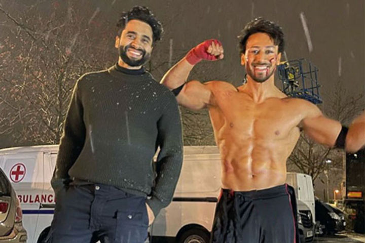 Tiger seen shirtless standing on the road amid snowfall is busy shooting for Ganapath