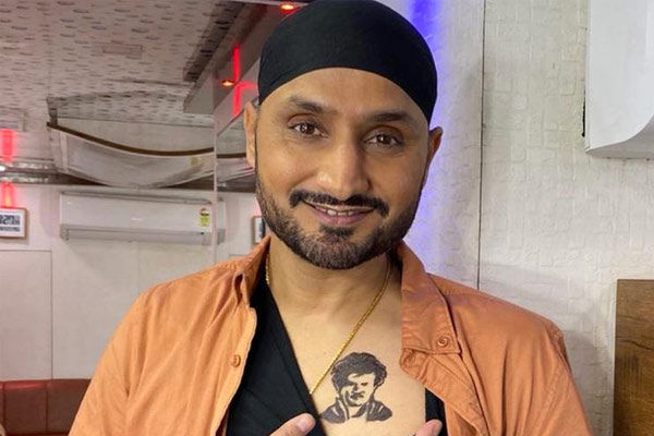 Harbhajan put Rajinis tattoo on his chest wished the superstar a birthday