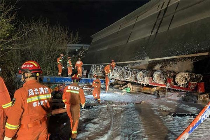 Four people died and eight were injured when part of a ramp bridge collapsed in Eizhou city of China