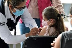 Despite Presidents objections in Brazil children are being vaccinated Bolsonaro will not get the dau