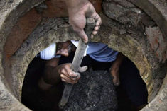 sanitation workers died of suffocation