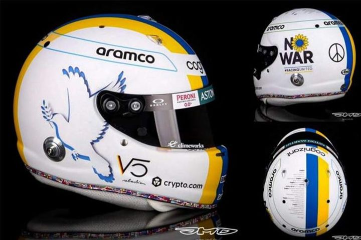 Sebatian Vettel Unveils No War Helmet At Bahrain Test