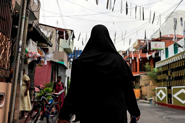 burqa clad woman attacked crpf camp with petrol bomb in sopore