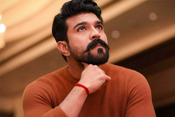 after the success of rrr ram charan distributed gold coins 