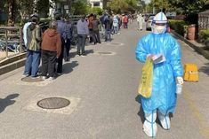 thousands of people arrested for breaking corona rules in shanghai 23000 new cases found yesterday