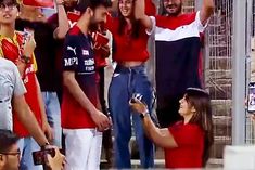 girl loses heart at rcbs fan expresses herself on her knees in the match