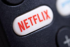 netflix sued shares continue to fall