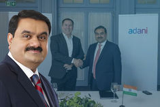 gautam adani to take over ambuja and acc cement business