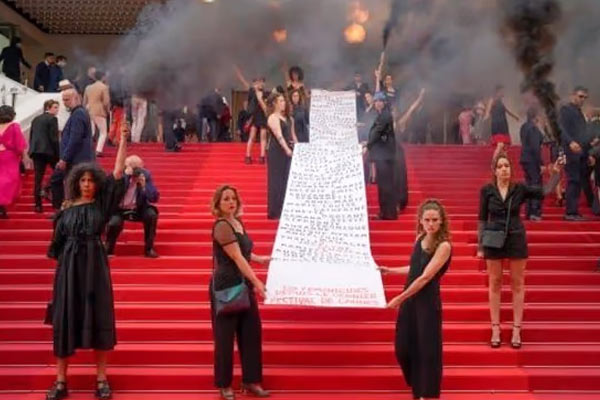 crime against women in france smoke grenades were thrown on the red carpet in cannes in protest even