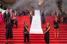 crime against women in france smoke grenades were thrown on the red carpet in cannes in protest even