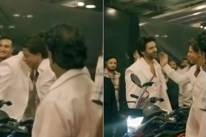 shahrukh hugged karthik at the event