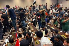 protesters enter iraqi parliament raise slogans against iran