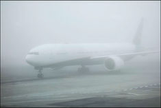 100 flights delayed in delhi due to fog more than two dozen trains slowed down