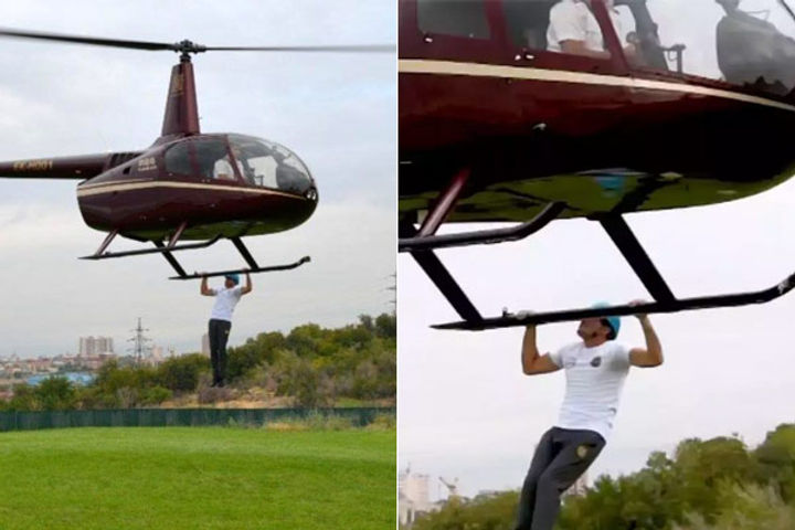 32 pullups in 1 minute by hanging from a helicopter made a guinness world record