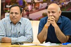 sisodia and jain get notice to vacate government house bjp raises questions