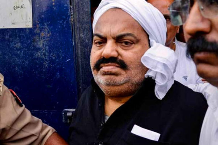 gangster atiq ahmed being taken to sabarmati jail was sentenced to life imprisonment yesterday