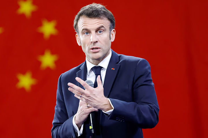french presidents visit to china said taiwan issue should be resolved peacefully