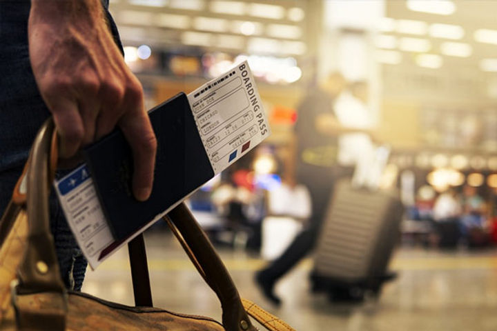 a sri lankan and a german national arrested for swapping boarding passes