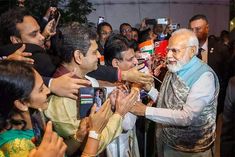 pm modi arrives in australia will meet 20000 people of indian origin in sydney