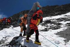 nepalese sherpa rescues climber on everest carries him out of death zone