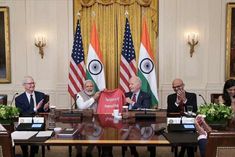 joe biden gifts modi a tshirt with ai written on it