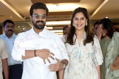 ram charan seen with new born baby